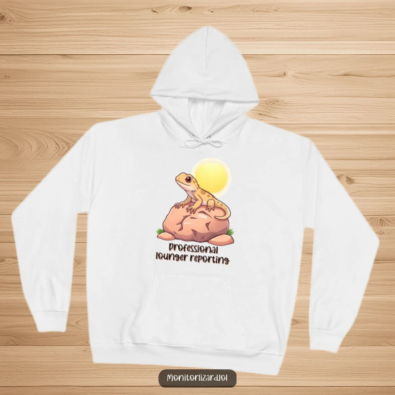 Funny hoodie depicting a content monitor lizard enjoying the warmth on a rock, perfect for cozy, humorous wear.