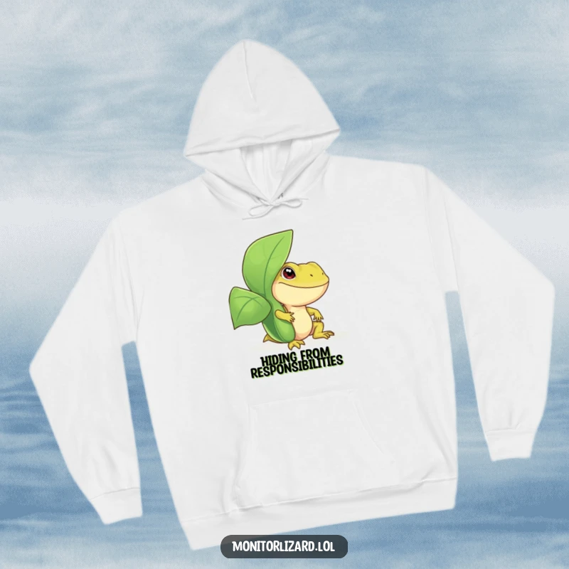 Funny monitor lizard hoodie with a smiling reptile peeking playfully from behind a big, leafy green plant, perfect for staying warm and stylish.