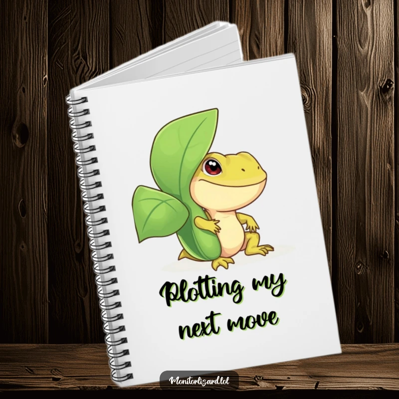 Funny monitor lizard notebook with a smiling reptile peeking from behind a large, green leafy plant, perfect for note-taking and journaling.