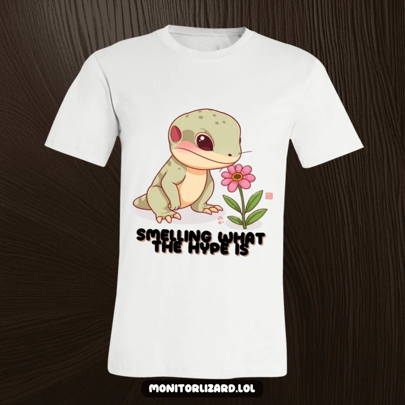 Funny monitor lizard t-shirt with a curious reptile sniffing a tiny, colorful flower, perfect for expressing love for nature and reptiles.