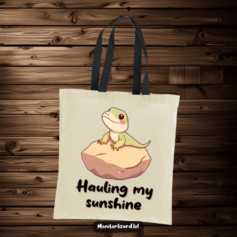 Funny Monitor Lizard Tote Bag: A cute monitor lizard character humorously sunbathes on a warm rock, perfect for carrying your relaxed essentials.
